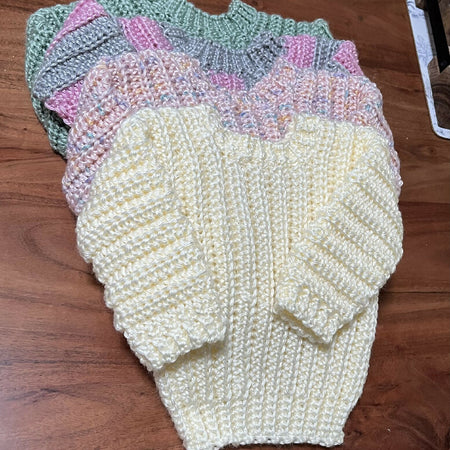 Hand crocheted children’s jumpers