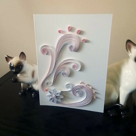 Quilled card in pink and white swirls