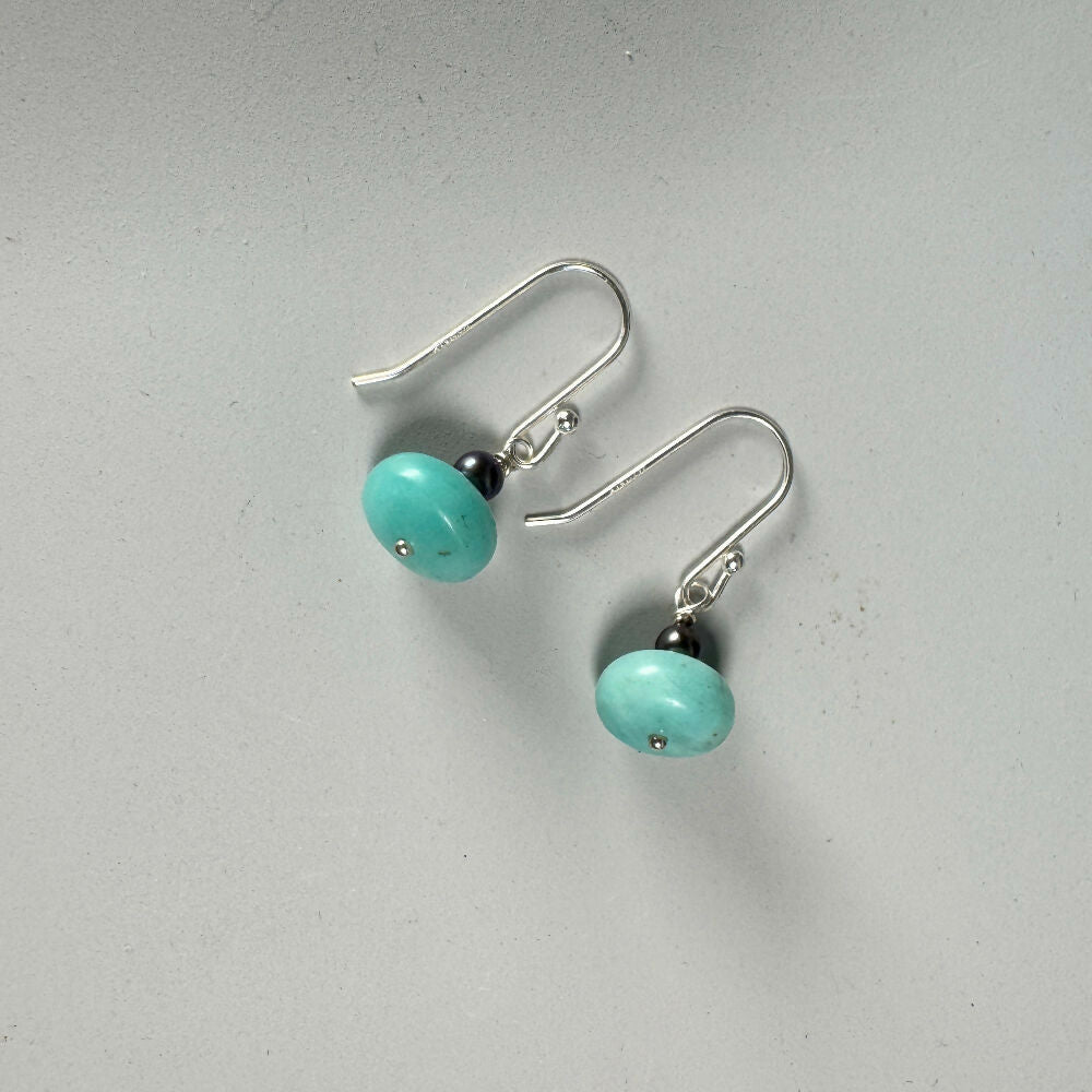 Amazonite & pearl earrings on mid-grey background