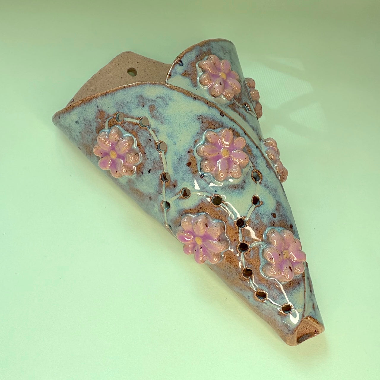 Ceramic wall cone orchid pot with flower design