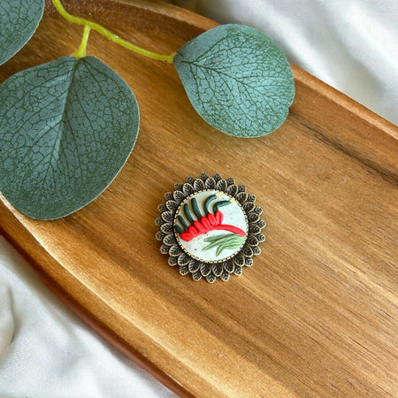 Kangaroo paw red and green brooch