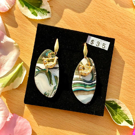 Lush Canopy Dreams: Marble Teardrop Earrings with Golden Sloth Charms