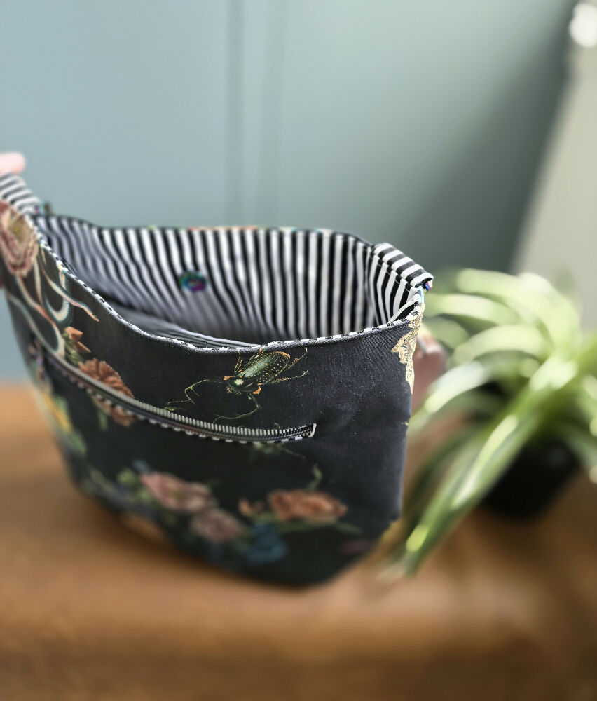 Large black crossbody bag. Snakes, bugs and flowers.