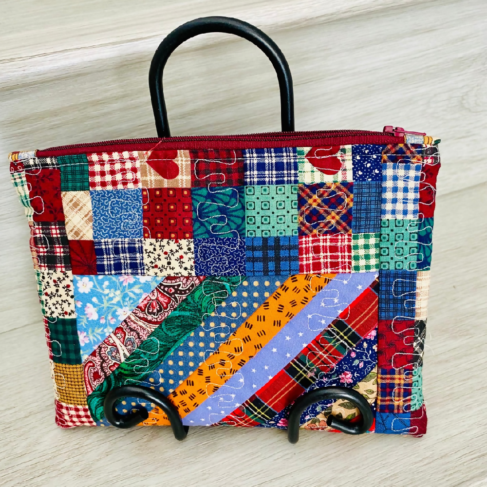 Strip pieced patchwork purse with borders