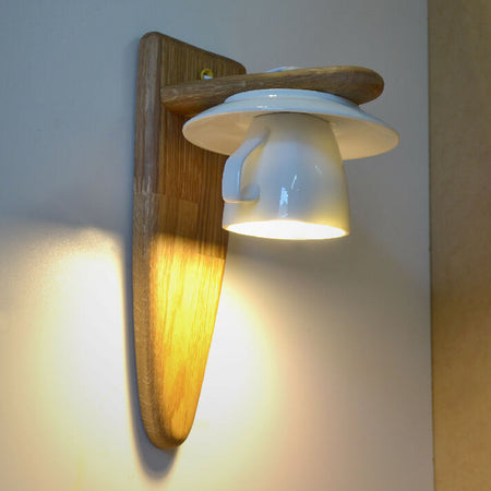 Wall light made of a cup and natural wood, wooden sconce