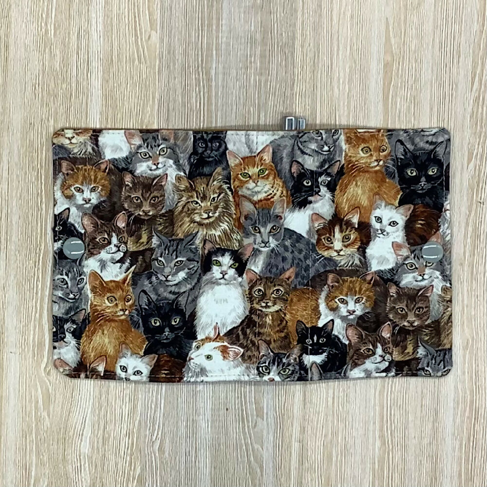 Cats refillable fabric pocket notepad cover with snap closure. Incl. book and pen.