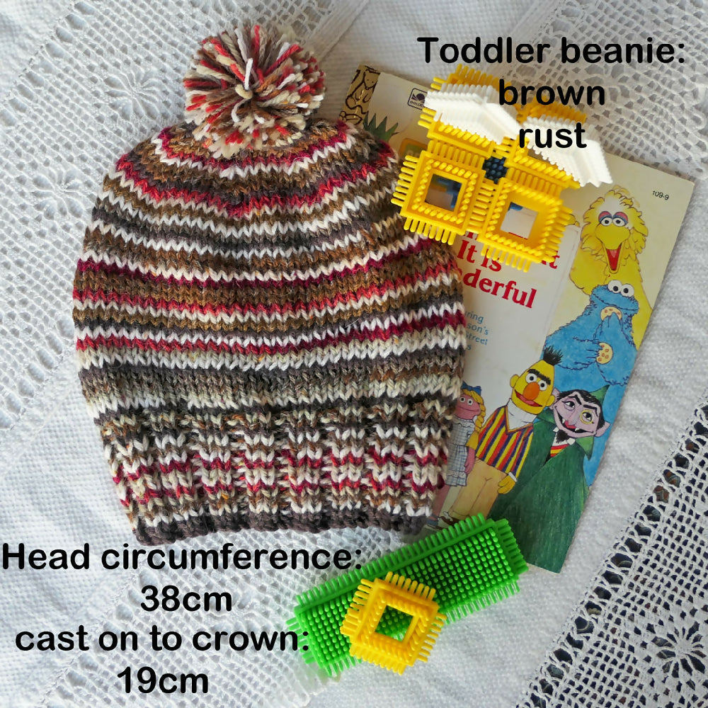 Striped fawn green beanie. Free post. Bulk buy option.