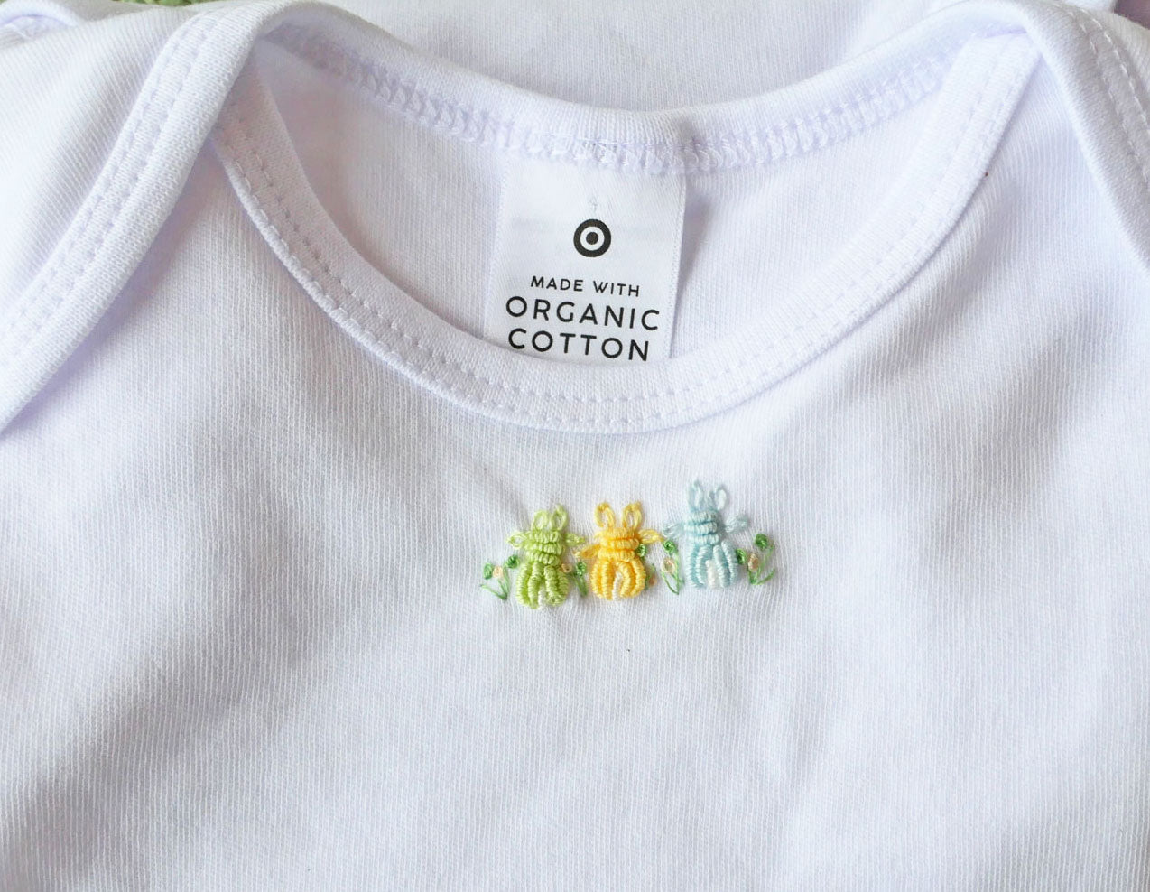 Singlets, body suits. Hand embroidered for babies. Free post.
