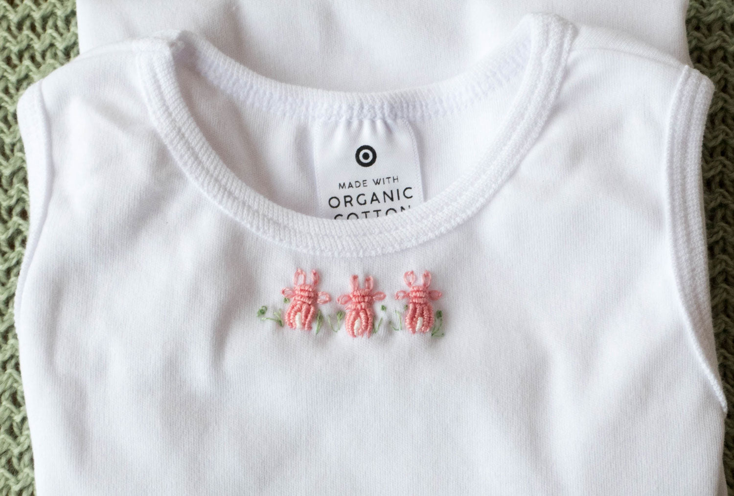 Singlets, body suits. Hand embroidered for babies. Free post.