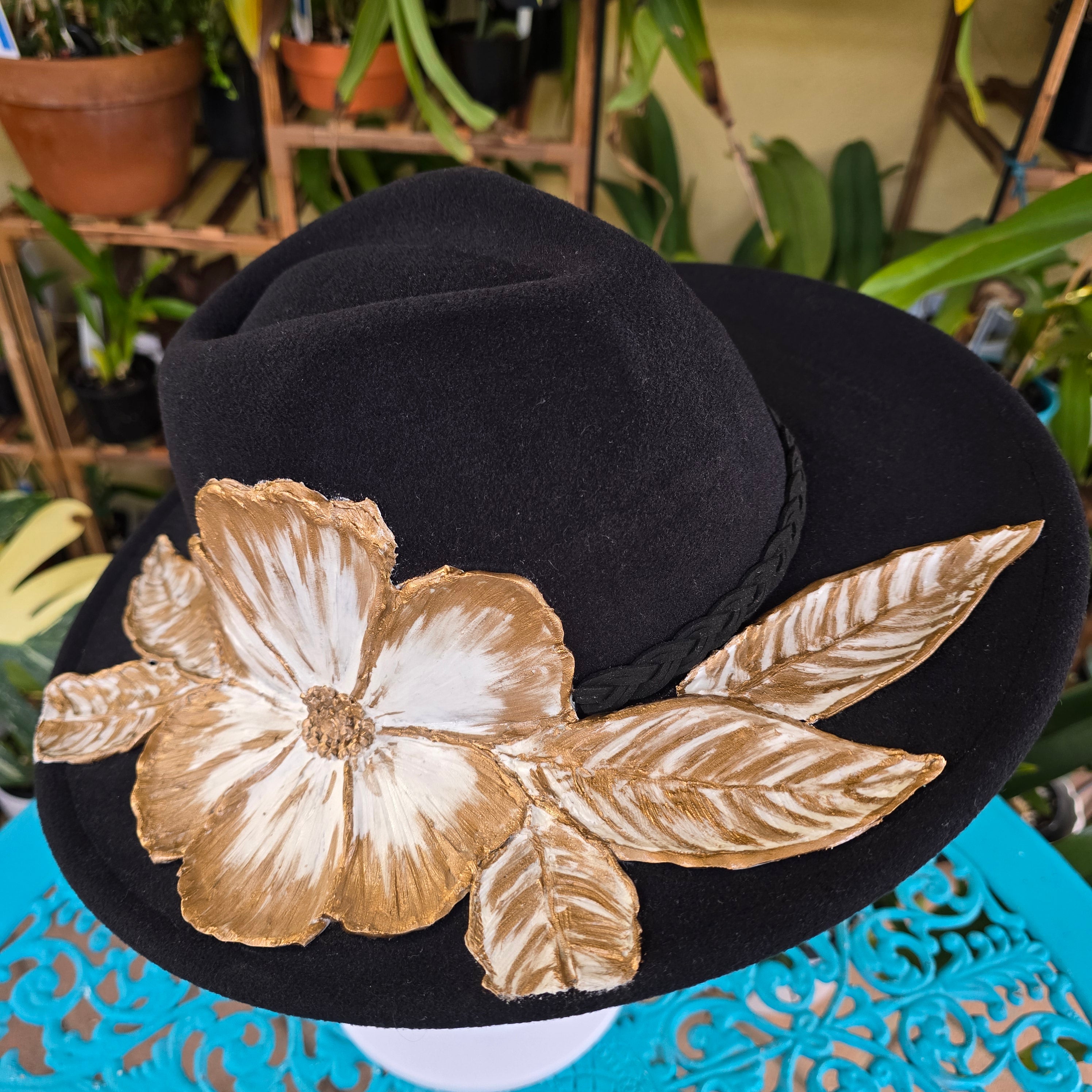 Textured fedora hat with bold floral design