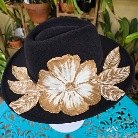 Textured fedora hat with bold floral design