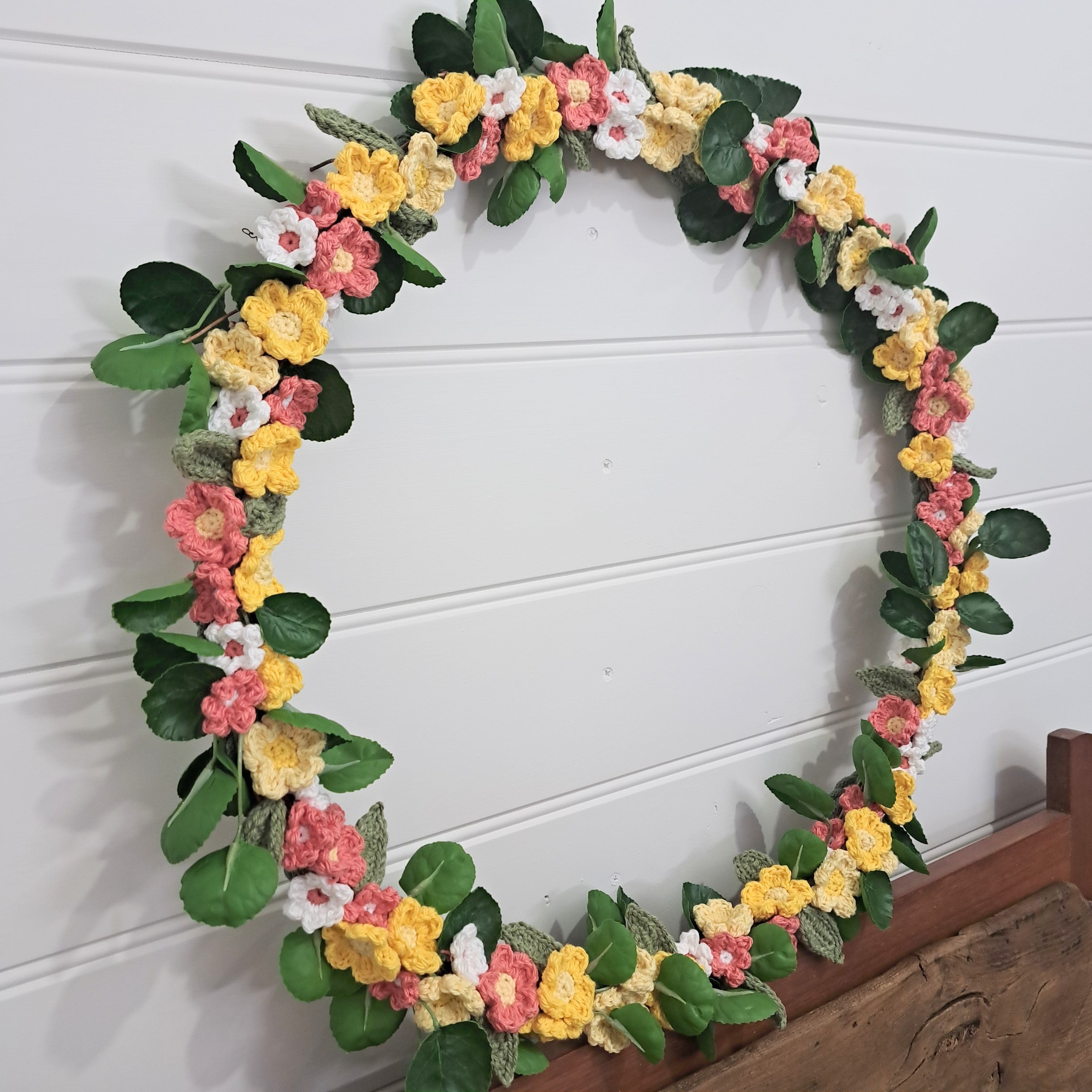 Handmade crochet spring flower wreath, yellows, pinks, white