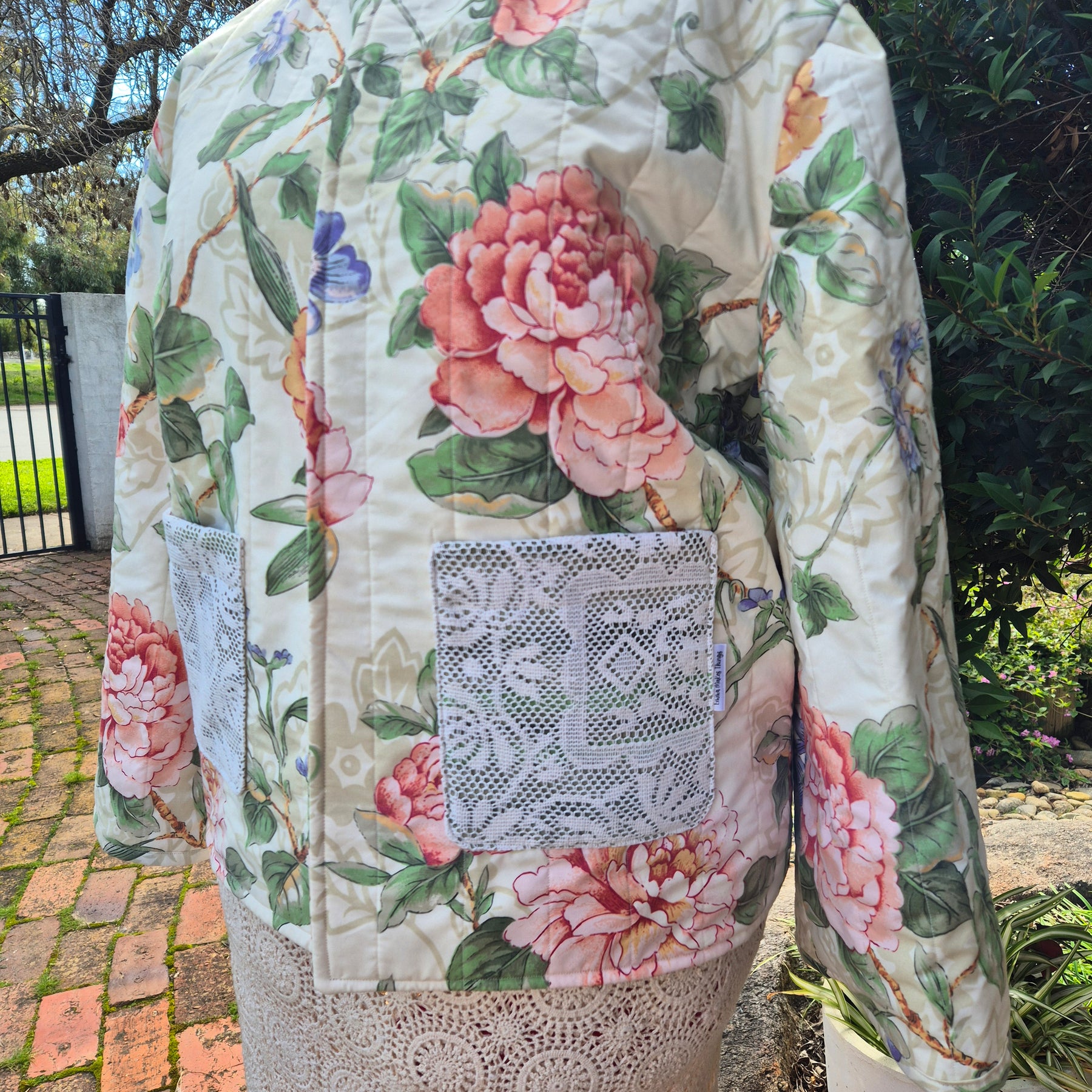 Floral quilted jacket size 10-12