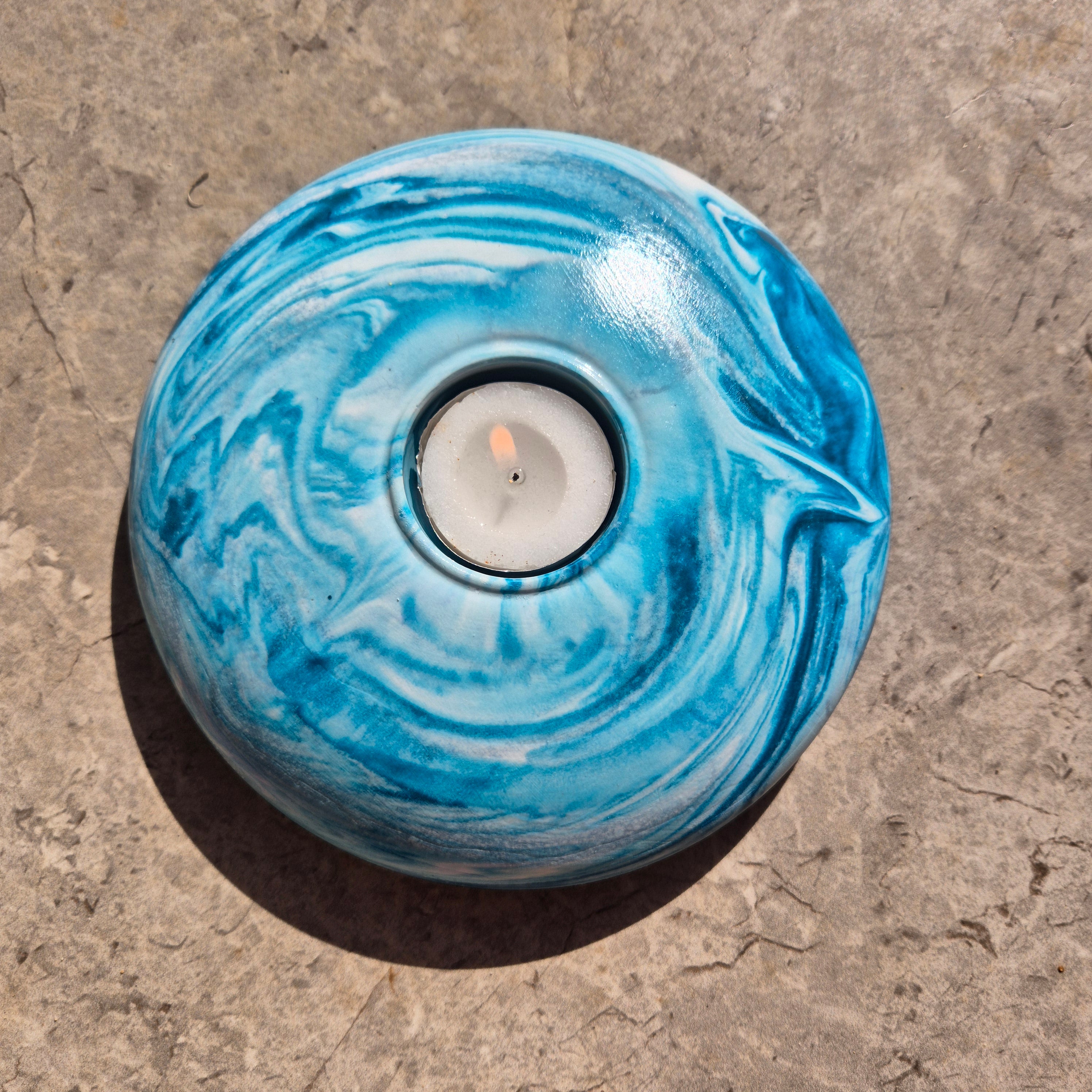 Large round concrete tealight candle holder in teal