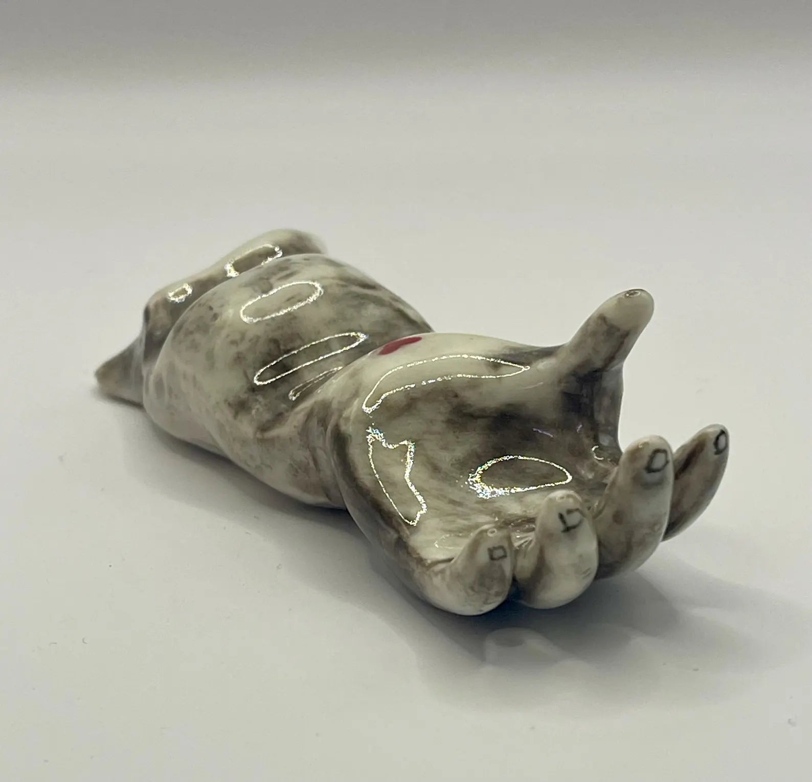 Handmade porcelain ‘helping hand’ brush rest