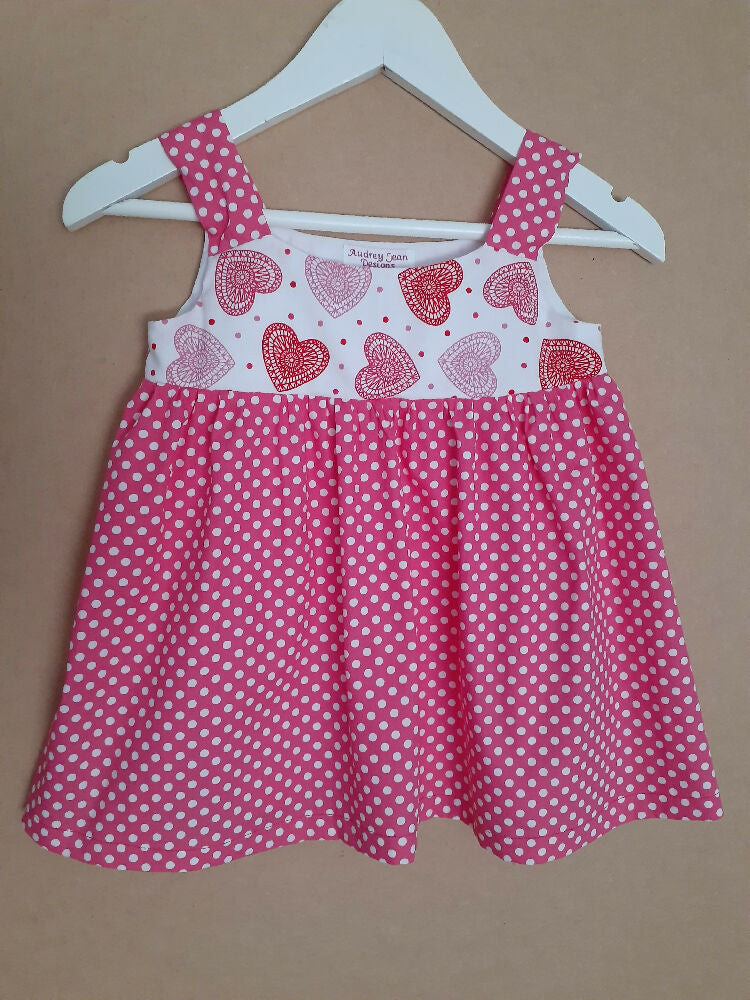 Cute child's dresses sizes 1-6. One-Of-A-Kind Print Bodice with Contrasting Spotty Skirt & Straps.