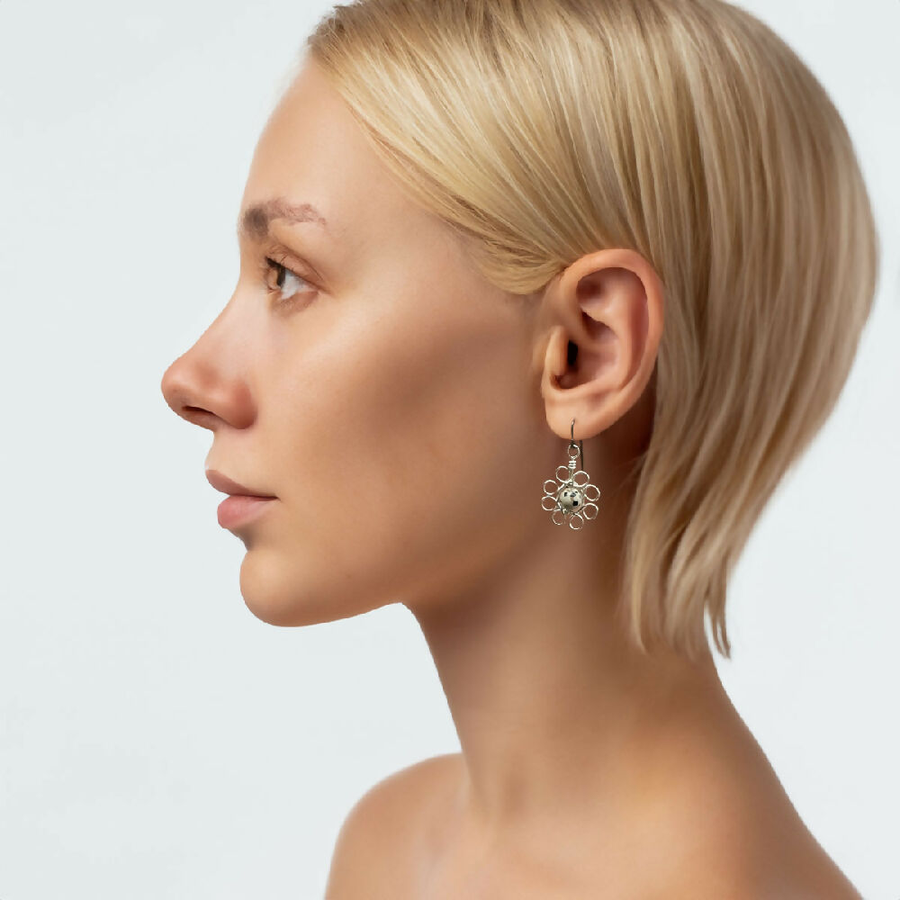 Fine silver flower + dalmatian jasper earrings model