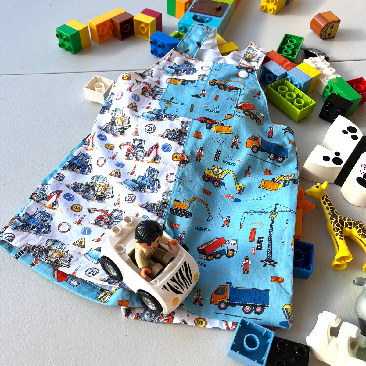 baby overalls/shorts | construction trucks
