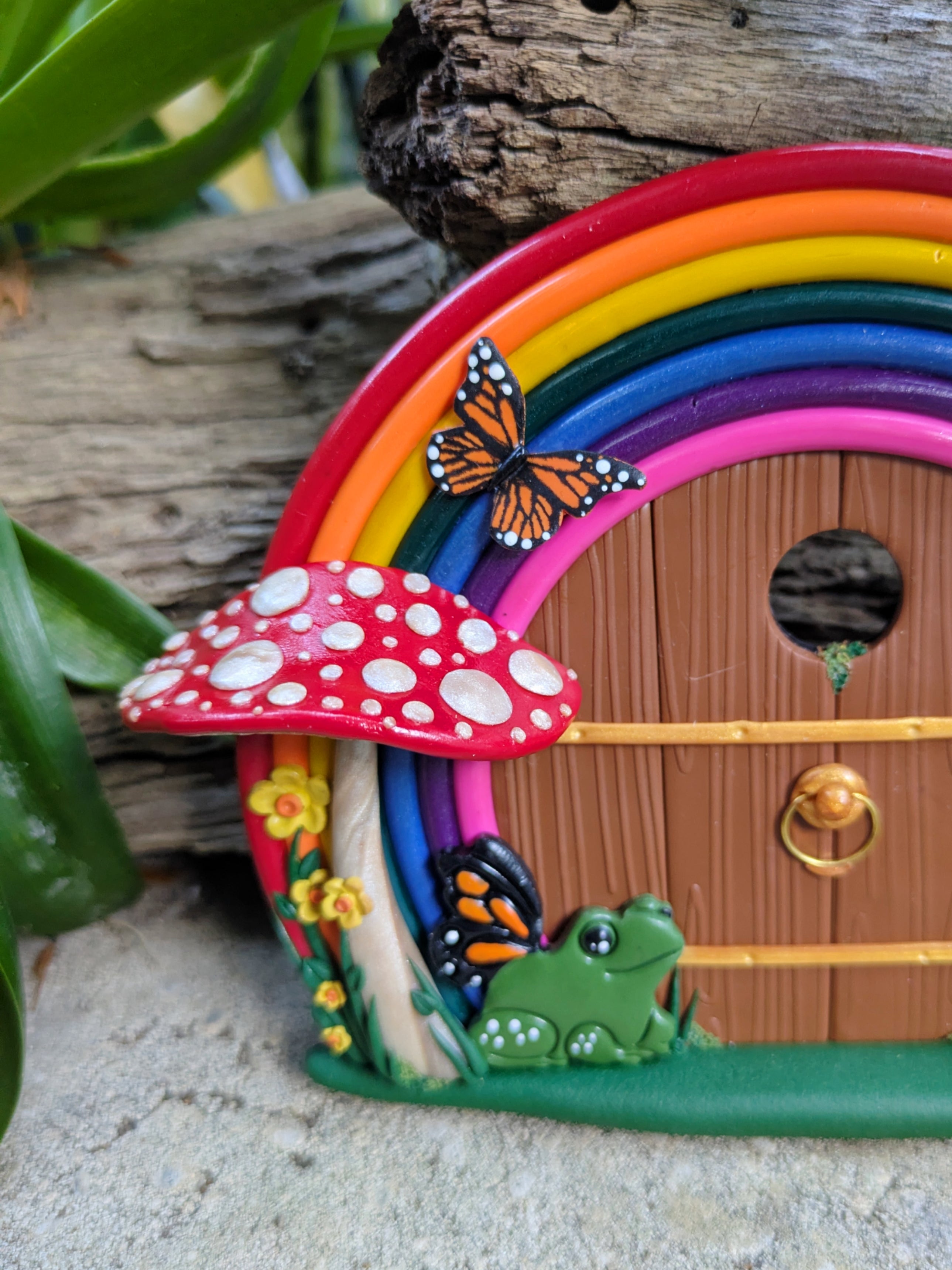 Hand-Sculpted Rainbow Fairy Door with Butterfly-Winged Frog