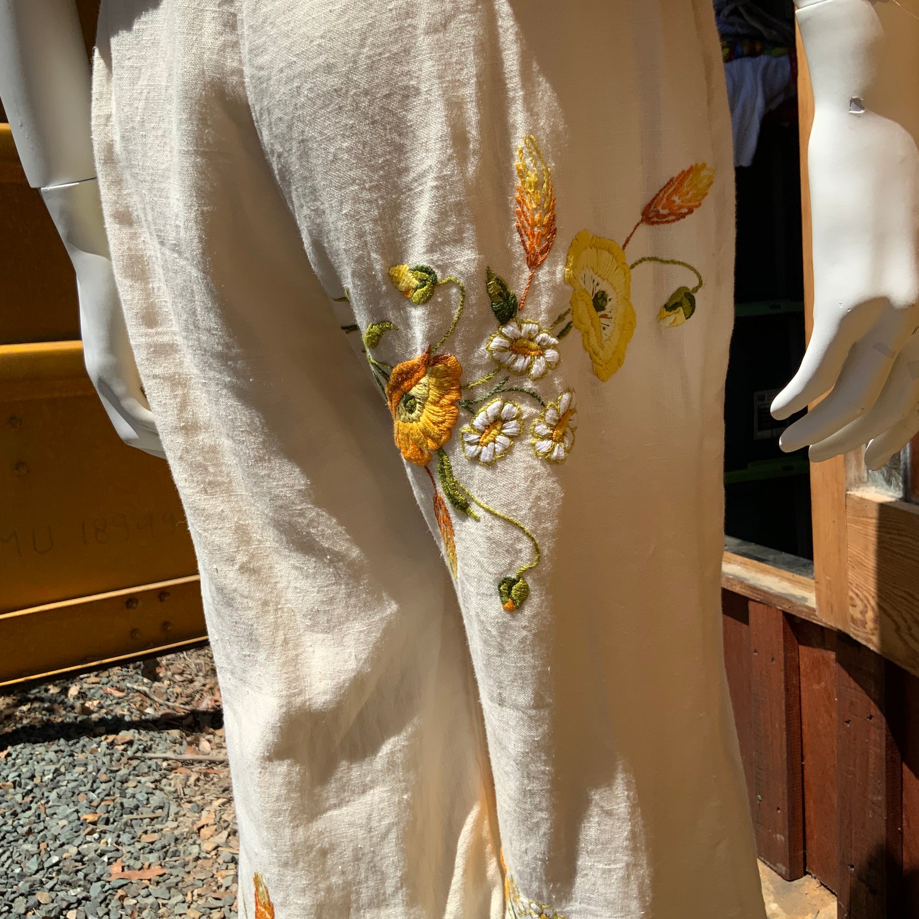 Upcycled embroidered linen tablecloth into "Flower Power" Bell Bottoms