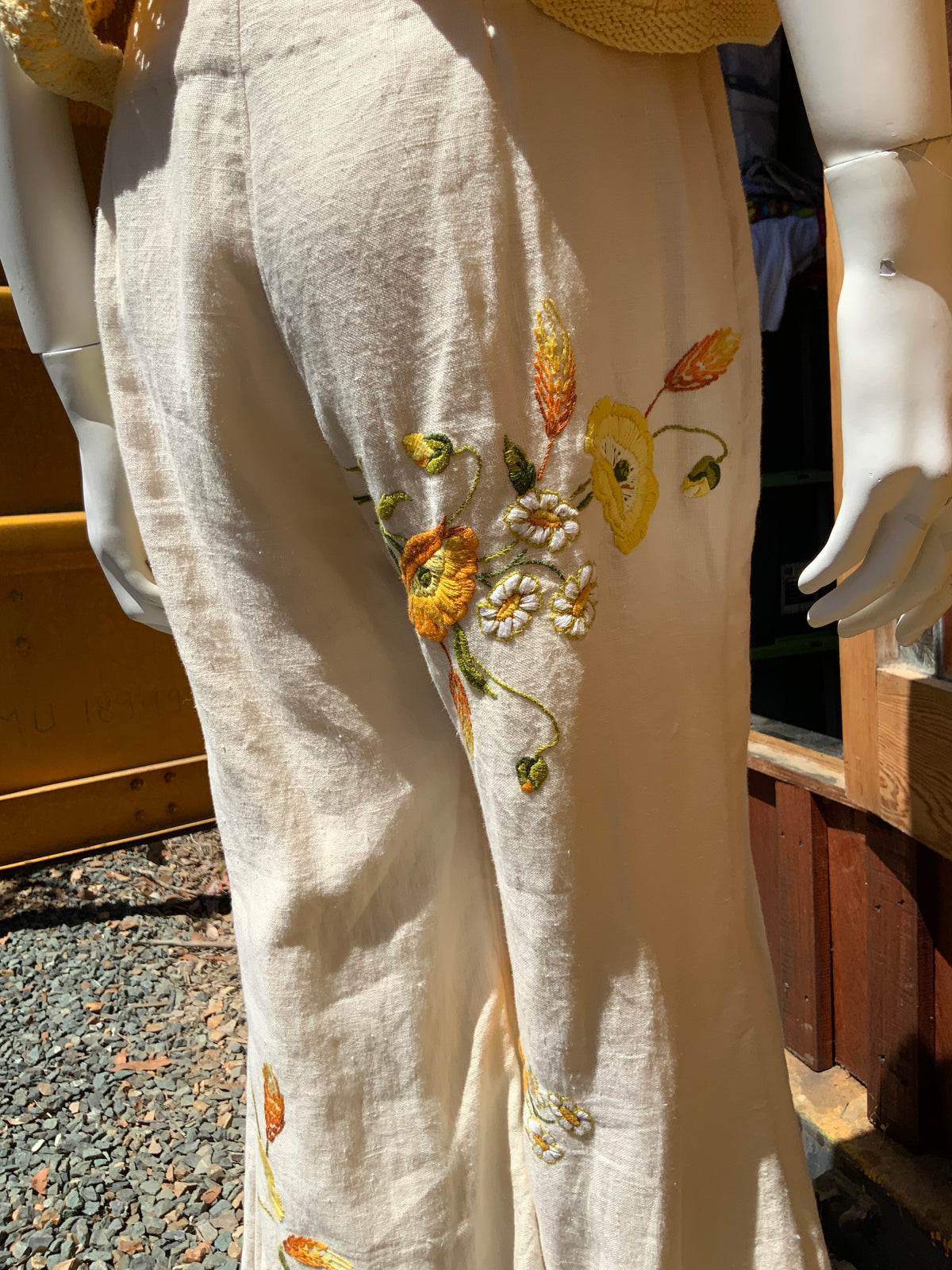 Upcycled embroidered linen tablecloth into "Flower Power" Bell Bottoms