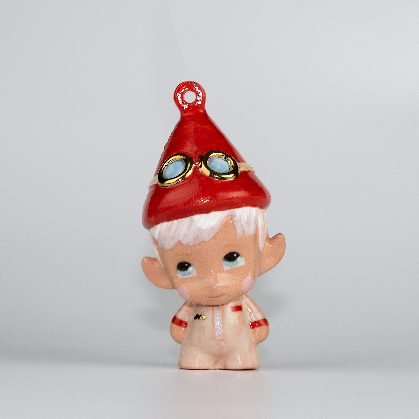 Handmade Porcelain Christmas ornament. One-of-a-kind. Zac, the sleigh mechanic Elf.