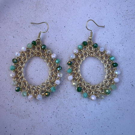 Gold wire hoop earrings, green crystals