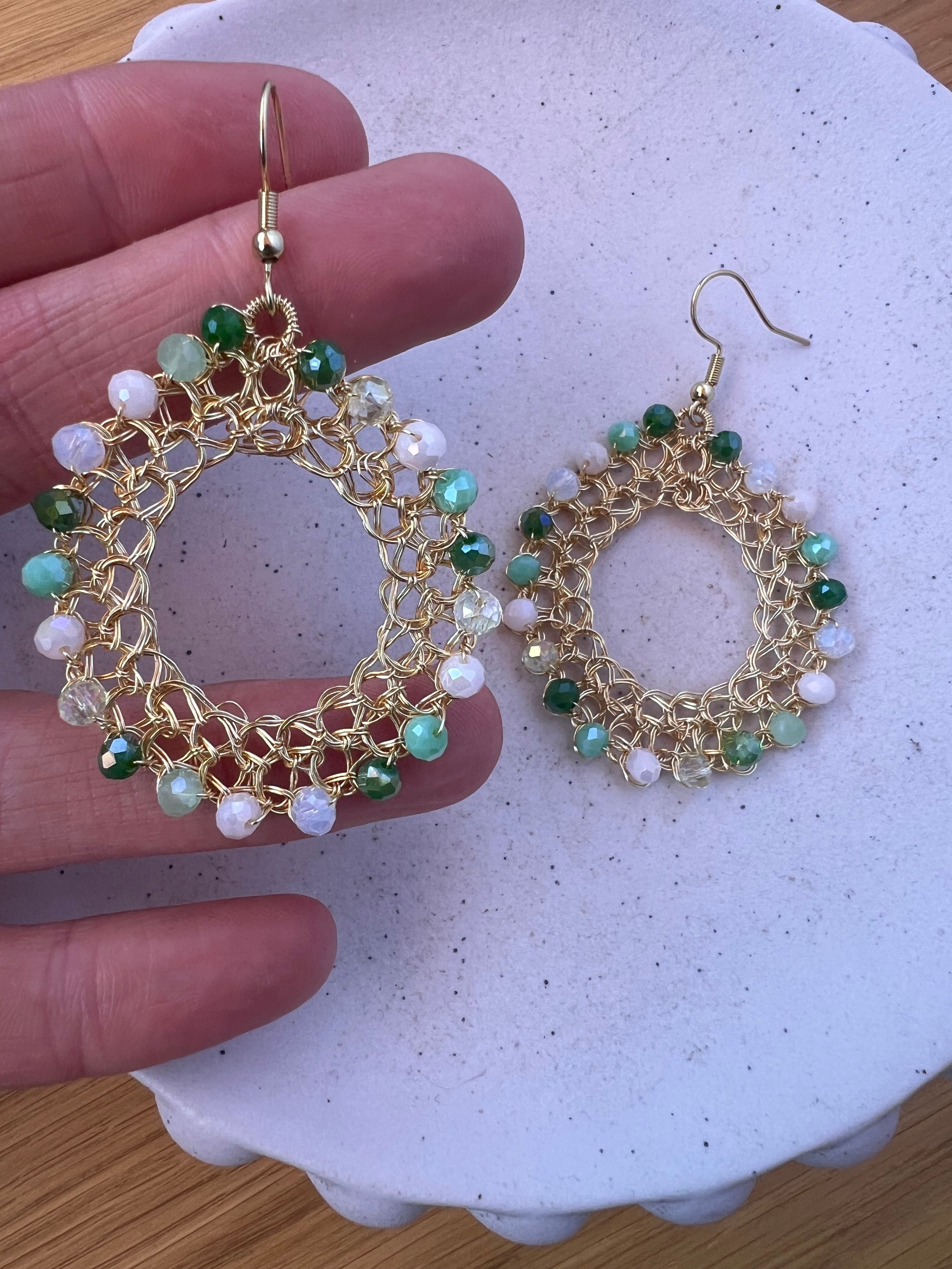 Gold wire hoop earrings, green crystals