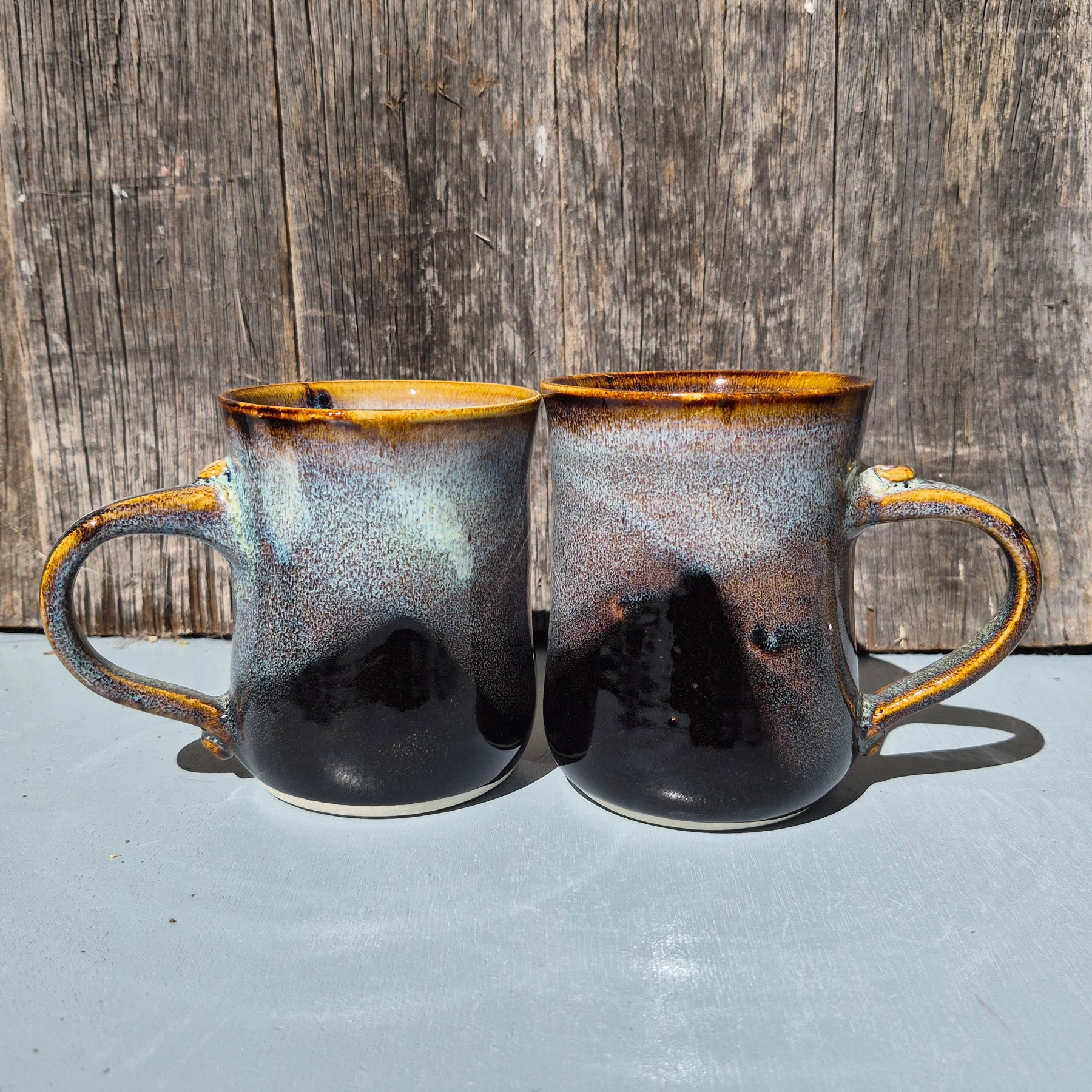 Large hand made mugs in speckled brown and white