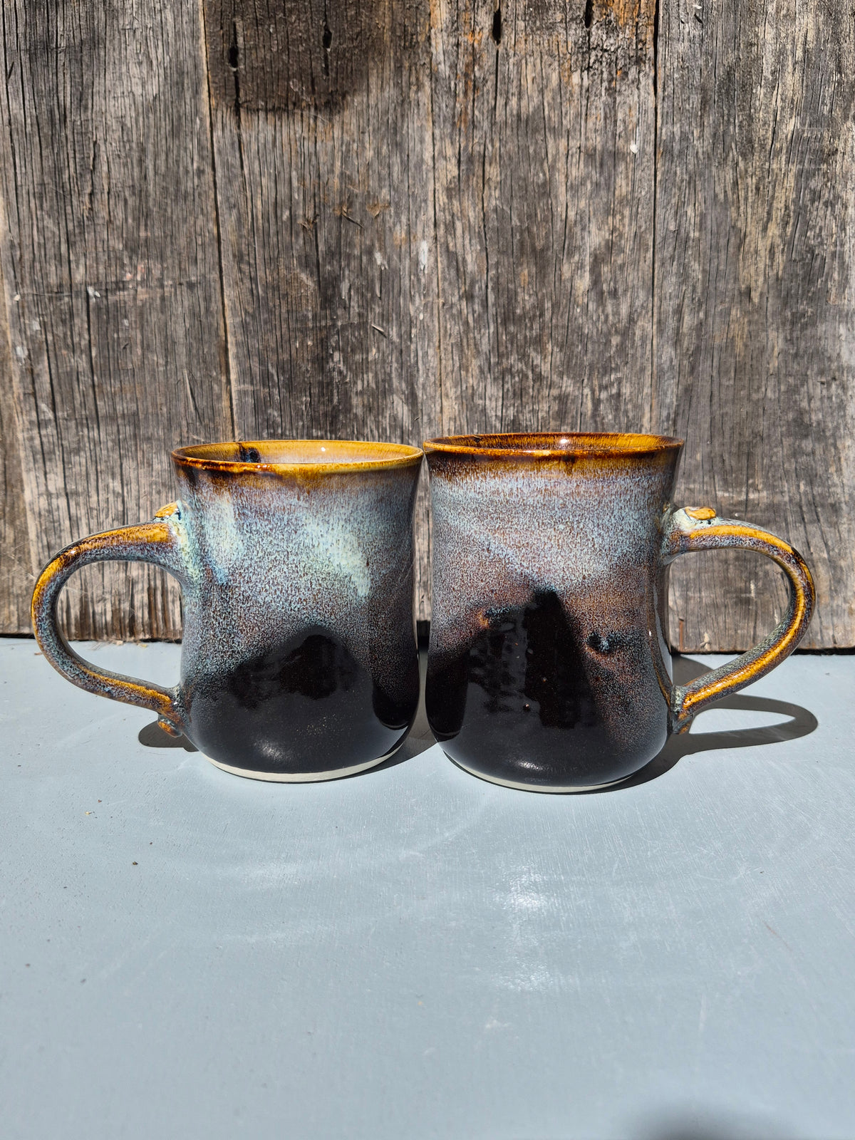 Large hand made mugs in speckled brown and white