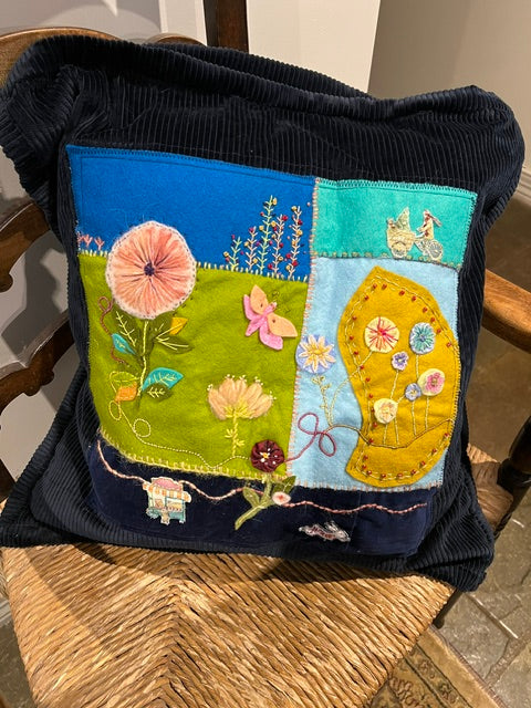 Handmade and hand embroidered cushion