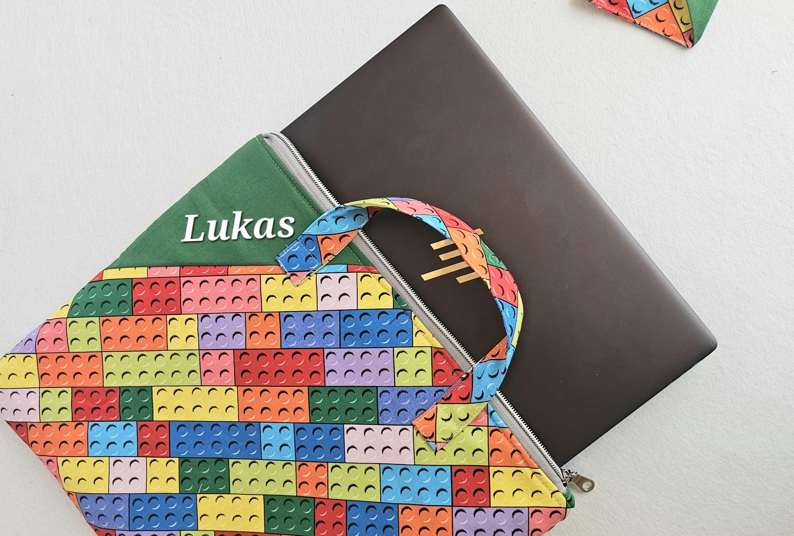 Personalized Lego inspired library and laptop bag with glow-in-the-dark name