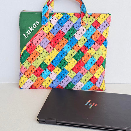 Personalized Lego inspired library and laptop bag with glow-in-the-dark name