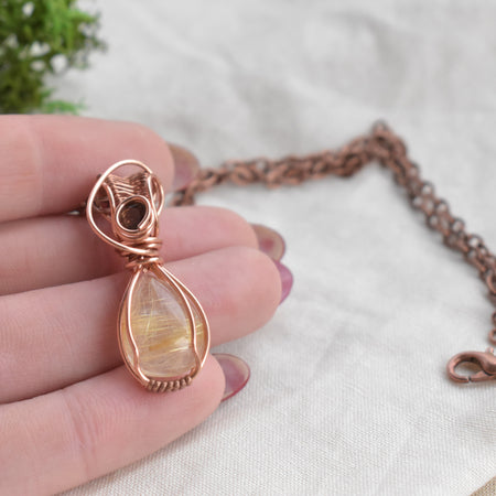 Gilded Threads - Handcrafted Golden Rutile & Smoky Quartz Pendant