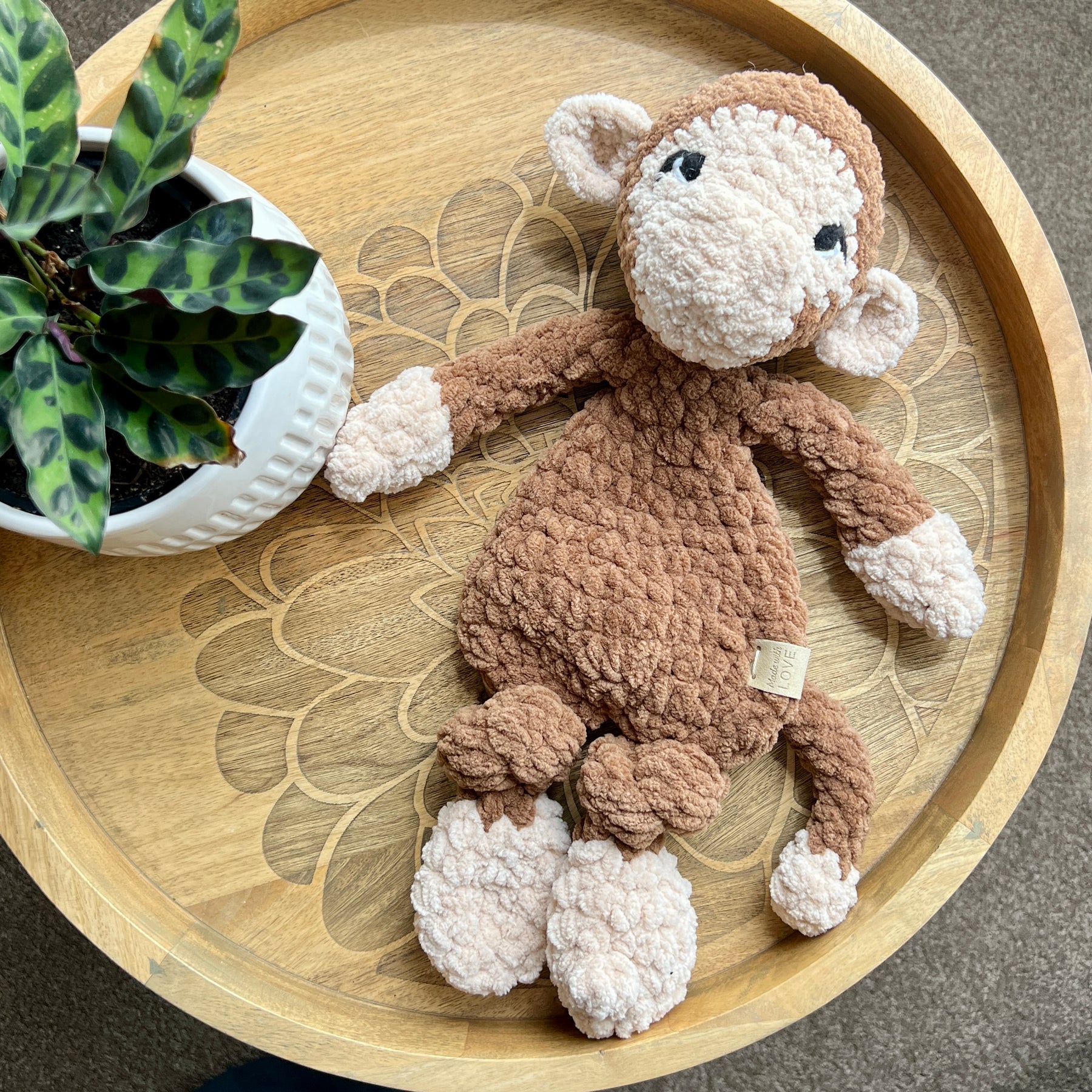Handmade modern crochet toy monkey lovey snuggler.