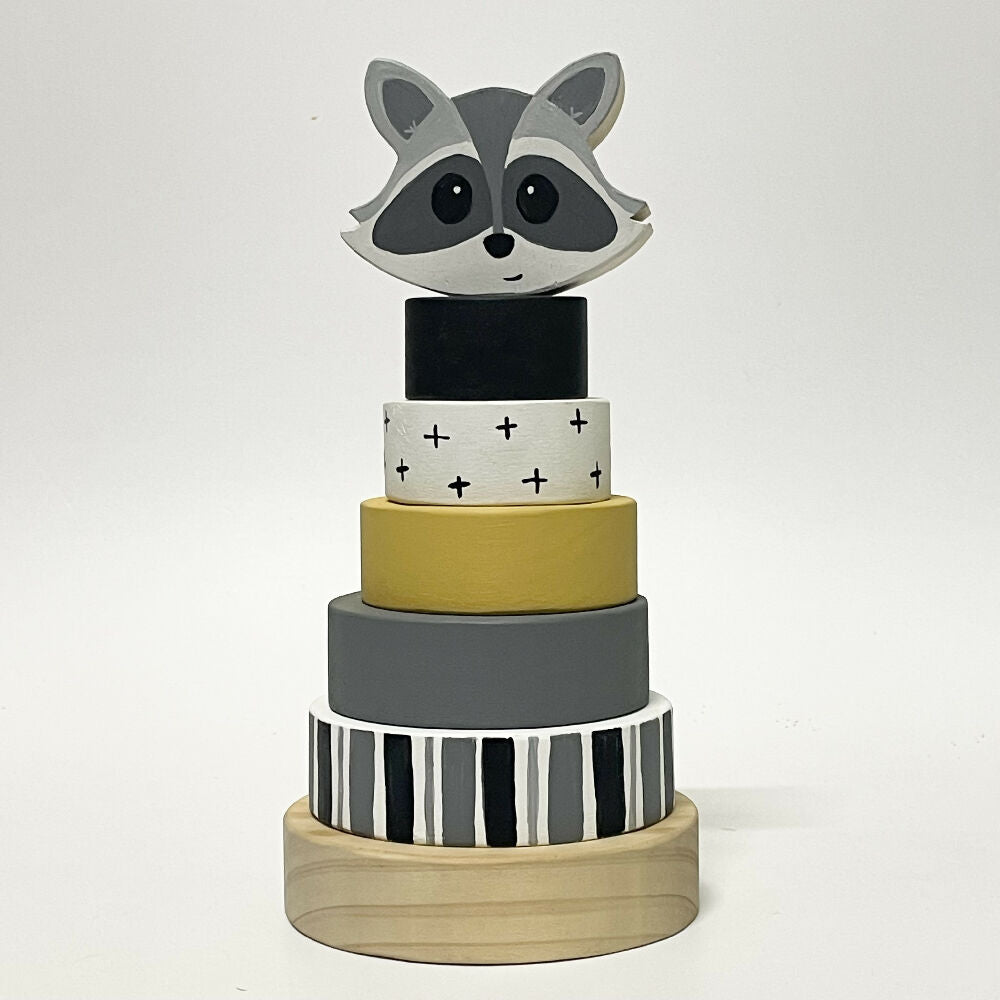 Ring stacker with raccoon topper.