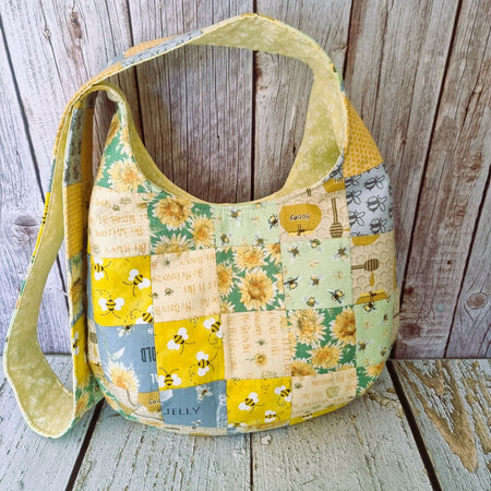 Sunshine yellow, bees & flowers upcycled patchwork hobo bag.