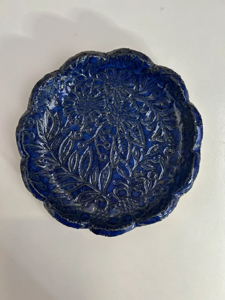 Scalloped trinket bowl with embossed floral design