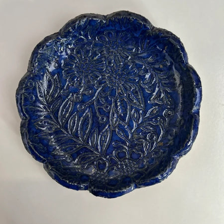 Scalloped trinket bowl with embossed floral design