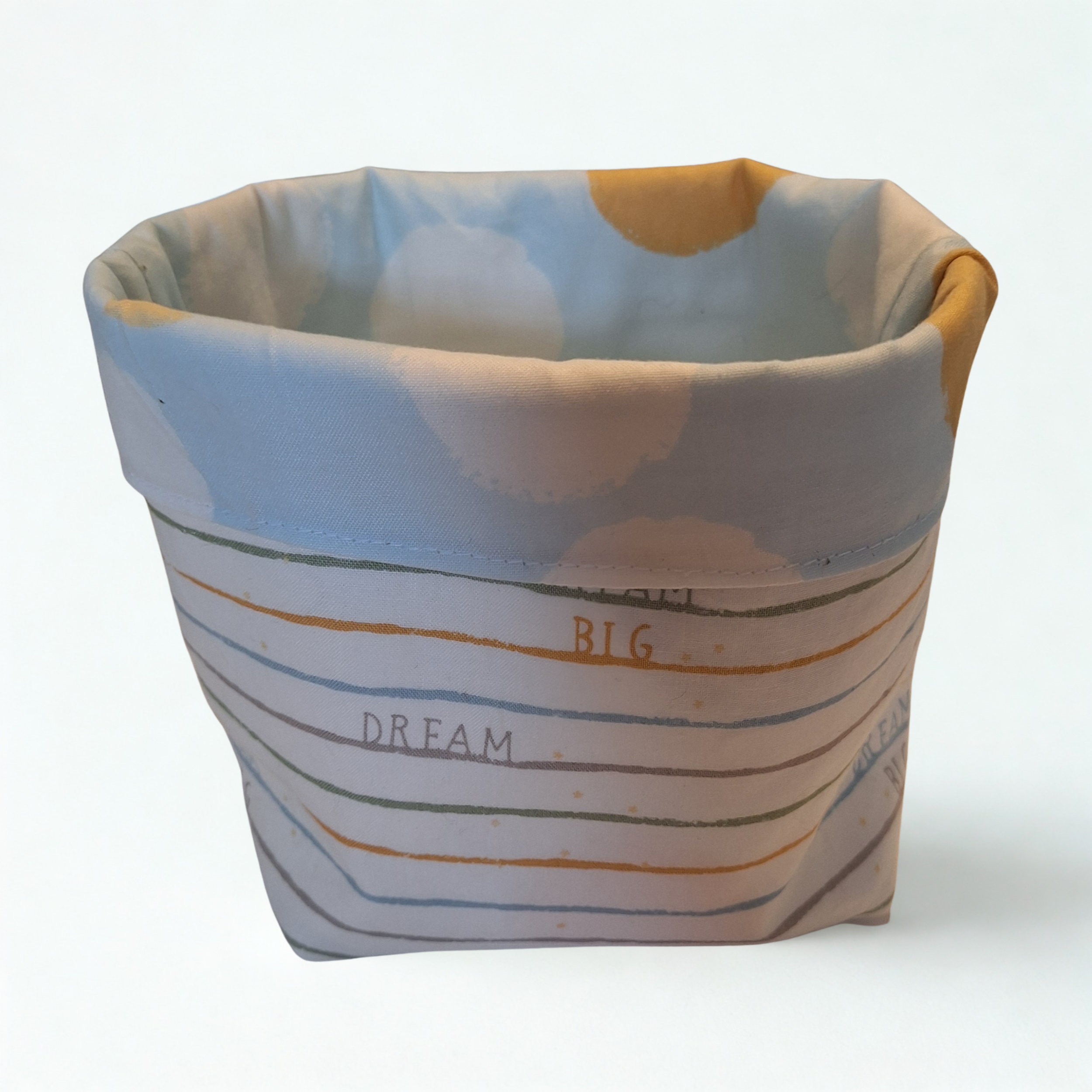 Reversible handmade nesting fabric baskets for baby's room