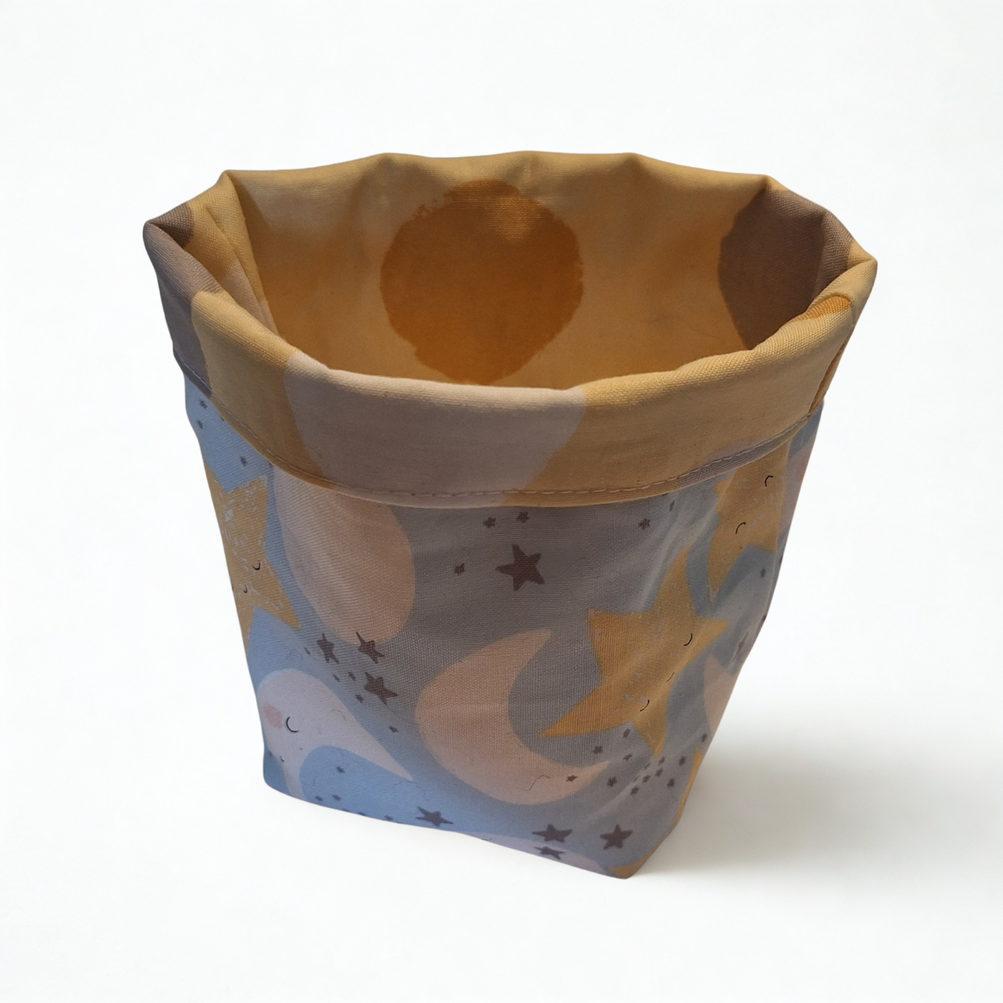 Reversible handmade nesting fabric baskets for baby's room