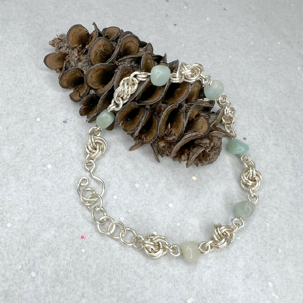 Silver plated love knot amazonite bracelet