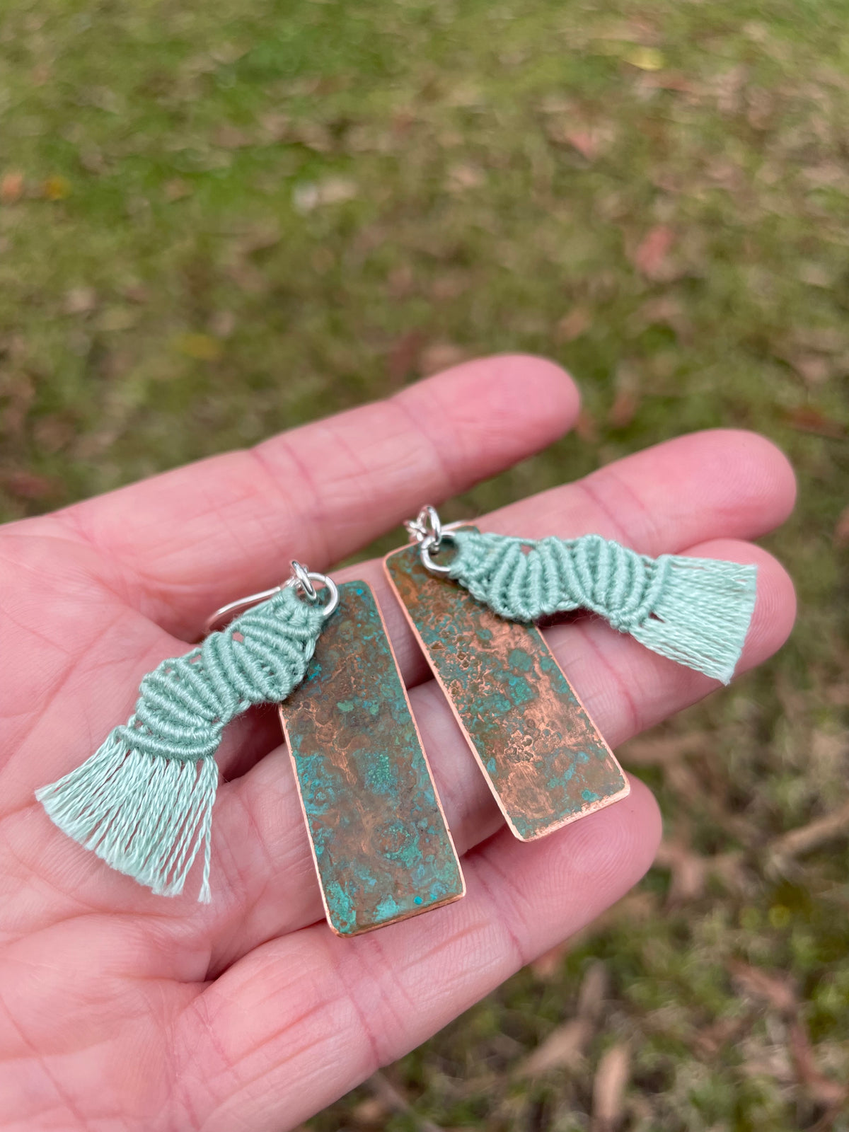 Sage green macrame thread on patinated copper