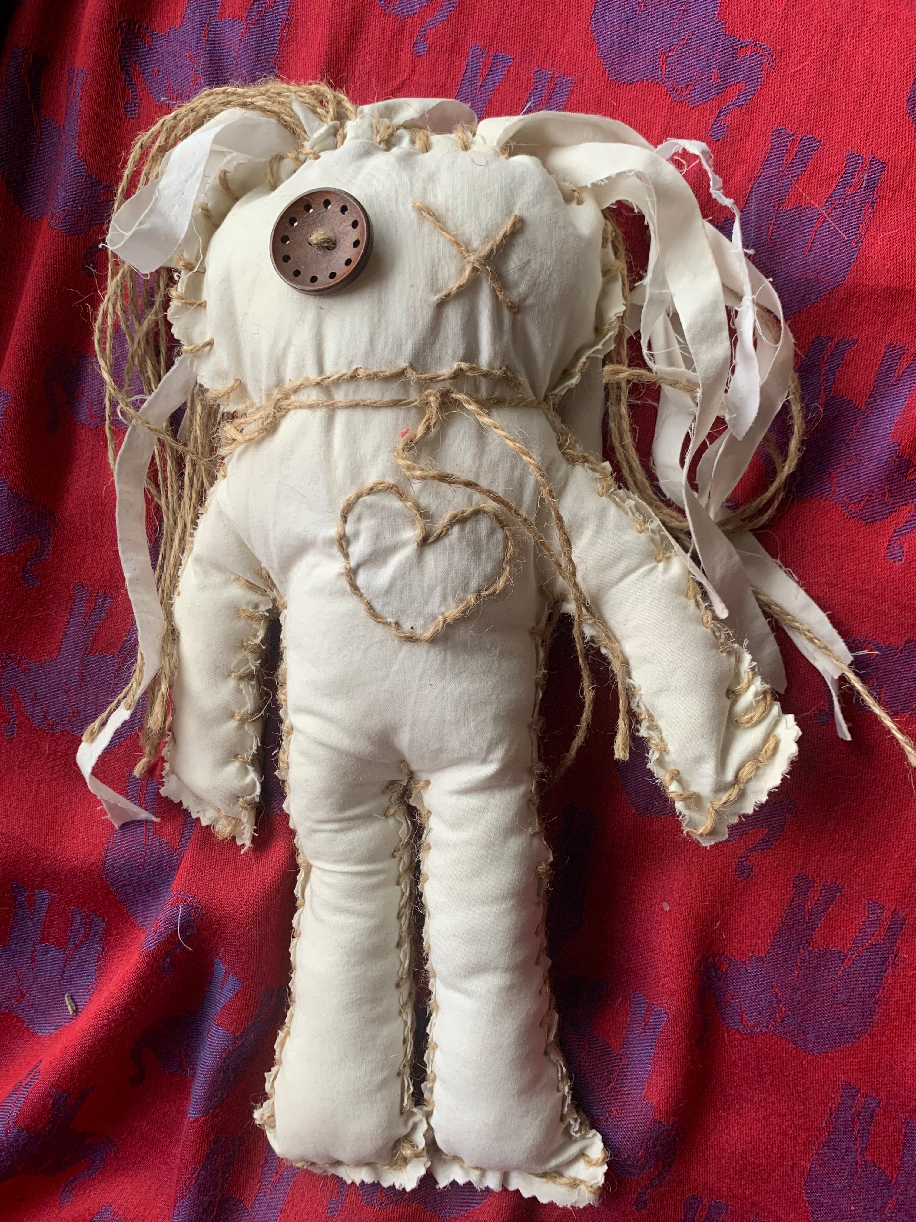 Doll hand made with calico and string