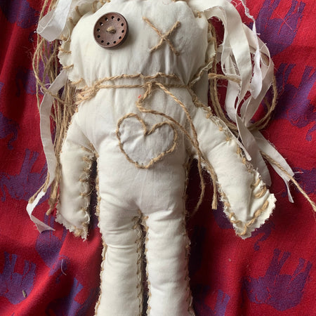 Doll hand made with calico and string
