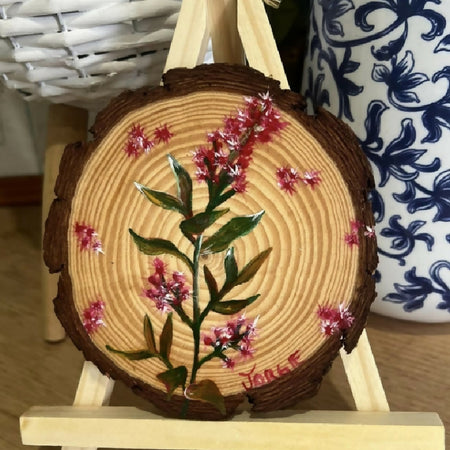 Botanical on sliced log with easel display