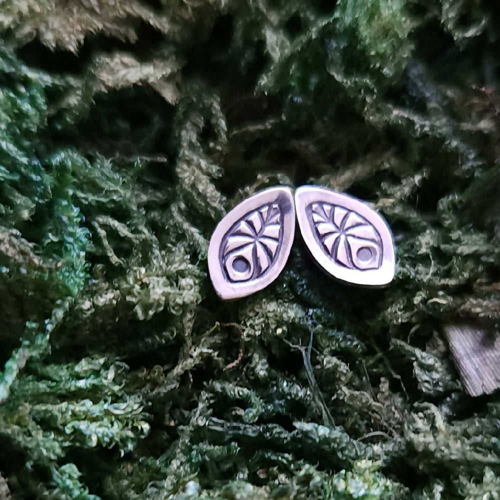 Tiny sterling silver studs with leafy pattern