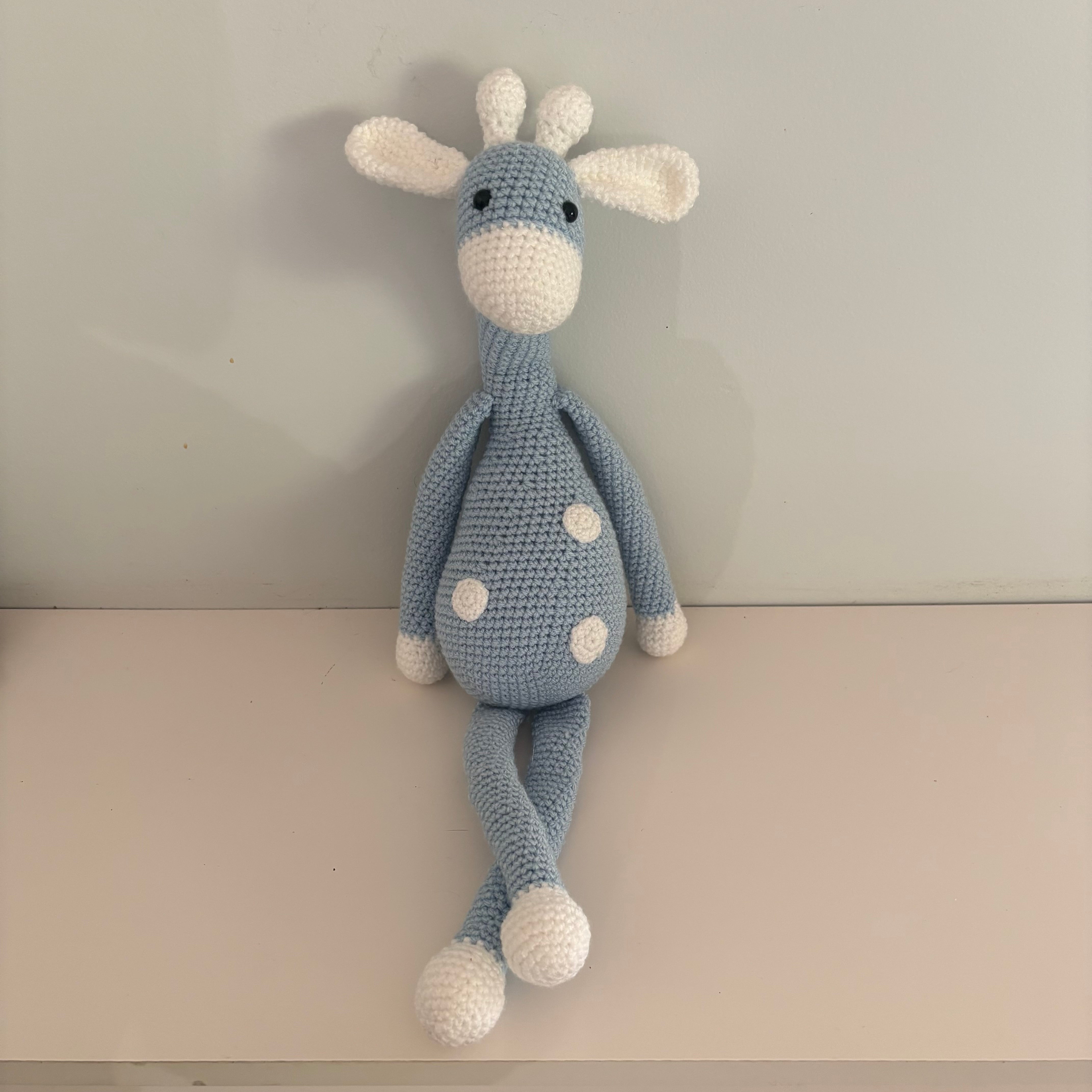 Long legged goofy giraffe crochet soft toy