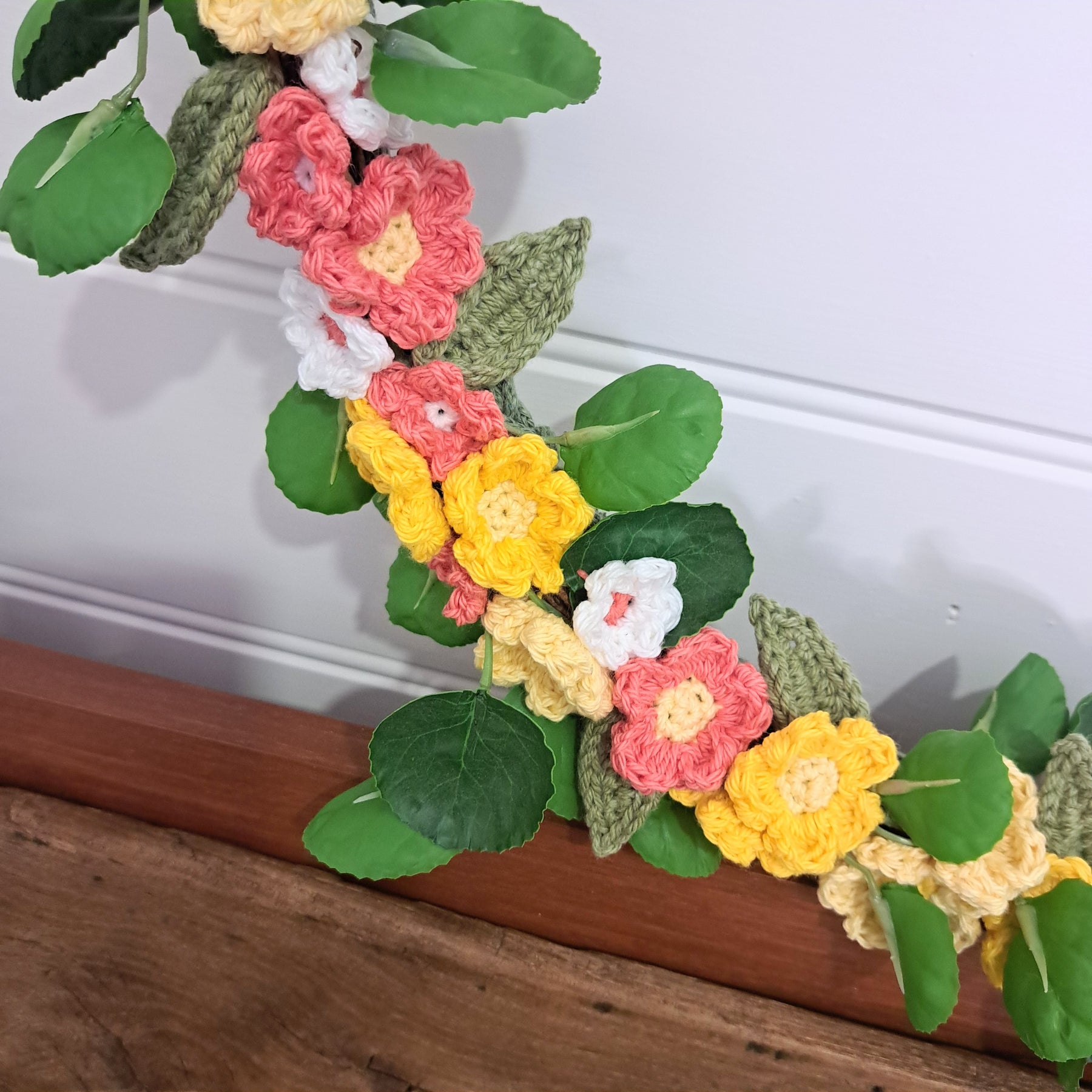 Handmade crochet spring flower wreath, yellows, pinks, white