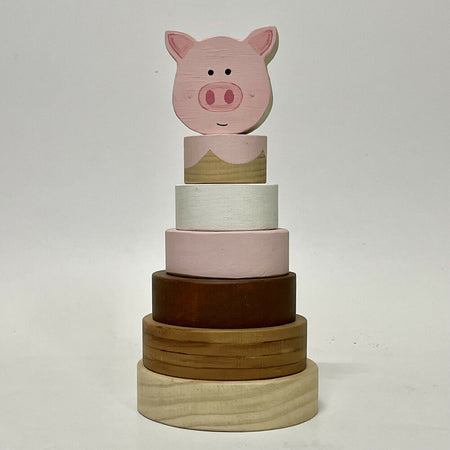 Ring stacker with pig topper.